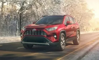 2019-Toyota-RAV4-front-three-quarter-in-motion-05