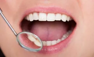 ارتباط عارضه فشار خون بالا با بیماری‌های میکروبی دهان