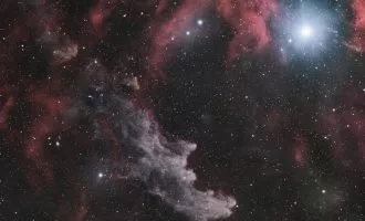 تصویر روز ناسا: ستاره بتا شکارچی در مقابل سحابی سر جادوگر